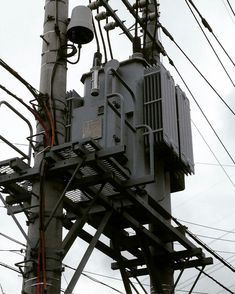 an electrical tower with lots of wires attached to it