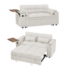 two white couches sitting next to each other