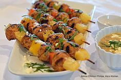 the skewers have pineapples on them and are ready to be eaten