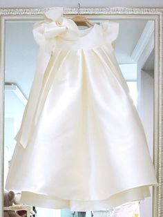 Fitted Baptism Dress With Bow, White Bow Dress For Birthday, Fitted White Dress For Birthday, White Fitted Dress For Birthday, Elegant Dress For First Birthday In Spring, Elegant Spring Dress For First Birthday, White Bow Dress For First Birthday, White Dress With Bow For First Birthday, White Short Sleeve Birthday Dress