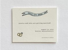 a wedding card with two rings on it