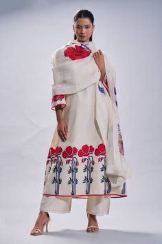 Buy Ivory Chanderi Embroidered Floral Round A-line Tunic Set For Women by Taika by Poonam Bhagat Online at Aza Fashions. White Cotton Silk Dress With Traditional Drape, Designer Cream Sets With Printed Motifs, Designer Cream Kurta With Printed Motifs, Designer Off White Dress With Floral Embroidery, Designer Off-white Dress With Floral Embroidery, Off White Designer Dress With Floral Embroidery, Cream Palazzo Set With Floral Embroidery In Chanderi, Cream Chanderi Palazzo Set With Floral Embroidery, Anarkali Sets With Printed Motifs In Cream