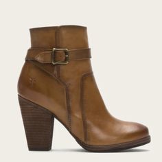 The Frye Patty Bootie Harnesses The Timeless Refinement Of A Classic Riding Boot In A Compact, All-Season Size. Rich Tan Leather Bears A Well-Worn Patina That Simply Gets Better With Wear. A Blocky Stacked Heel Elevates A Burnished Leather Bootie Trimmed With A Neat Belt At The Shaft. A Must Have For Your Fall & Winter Wardrobe! Like New Beautiful Condition Originally $379- Offer Me! Beautiful Tan Brown Color Genuine Italian Leather Topstitch Detailing Side Zip Closure For Easy On/Off Padded Ins Rugged Heeled Boots For Fall, Winter Leather Boots With Heel Pull Tab, Leather Boots With Heel Pull Tab For Winter, Winter Cognac Leather Boots, Cognac Leather Boots For Winter, Winter Leather Boots In Cognac Color, Leather Heeled Boots With Leather Footbed, Taupe Heels, Lace Booties