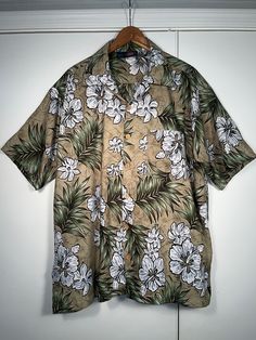 Maui Trading Company Hawaiian Shirt Size Large 100% Polyester  No damage, no odors, clean. Please message me with any questions or for size measurements needed. Packed and shipped with quality materials Khaki Short Sleeve Vacation Shirt, Khaki Short Sleeve Shirt For Vacation, Relaxed Fit Hawaiian Shirt With Button Closure, Hawaiian Collared Shirt With Buttons, Brown Hawaiian Short Sleeve Tops, Classic Relaxed Fit Hawaiian Cotton Shirt, Brown Short Sleeve Hawaiian Top, Classic Relaxed Fit Cotton Hawaiian Shirt, Hawaiian Cotton Shirt With Buttons