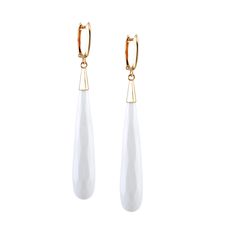 Indulge in the opulence of our 14K Yellow Gold White Agate Tear Drop Hoop Earrings. These elegant and sophisticated earrings feature lustrous white agate stones, known to promote harmony and balance. The teardrop shape adds a touch of femininity while the hoop design adds a modern twist. Elevate any outfit with these luxurious earrings. Specifications: Gemstone: White Agate Drop Length:42.mm (1.62") Metal Type: 14k Yellow Gold Closure Type: Huggie Hoop Snap Closure Materials High Polished 14-Kar Luxury White Hoop Earrings For Formal Occasions, Elegant Gemstone Hoop Earrings For Formal Occasions, White Gemstone Earrings For Evening, Luxury White Briolette Earrings, White Polished Finish Jewelry For Evening, Luxury Dangle Hoop Earrings, White Polished Fine Jewelry Earrings, Classic White Earrings With High Luster, Modern White Hoop Earrings For Formal Occasions