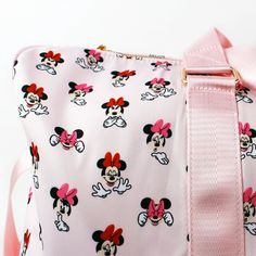 A Duffle for all occasions, for whatever you’re feeling, for wherever the journey takes you. Our Disney’s Minnie Mouse Expression Duffle features a shoulder strap, 2 top handles, a front pocket, a top zipper and an all-over print design showcasing Minnie Mouse with a variety of different facial expressions on a beautiful pink background. Printed Design Adjustable Shoulder Strap Two Top Handles Zip Style Opening Polyester 8.5" depth x 21" width x 14" height ©Disney Licensed Product Different Facial Expressions, Ereader Case, Bookmarks Kids, Pin Game, Bible Covers, Cooling Blanket, Disney S, Lunch Tote, Kids Coloring Books