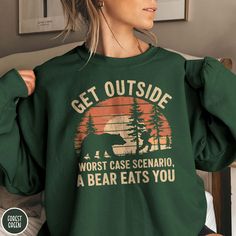 The perfect gift for the Outsider or Hiker in your life! This funny outdoor sweatshirt from Triangle Threads gives you a classic vintage sunset design with a humorous twist for anyone who loves a good day in the woods! The Gildan 18000 50/50 blend sweatshirt has a comfy, lived-in feel that is perfect for long hikes or lounging on the couch. So get outside and get yours today... after all what's the worst that could happen? * Product Highlights * Ideal for any situation, this Gildan 18000 heavy b Outdoor Graphic Print Crew Neck Sweatshirt, Graphic Print Crew Neck Sweatshirt For Outdoor, Outdoor Crew Neck Sweatshirt With Letter Print, Outdoor Letter Print Sweatshirt Crew Neck, Green Crew Neck Sweatshirt For Outdoor, Crew Neck Sweatshirt With Letter Print For Outdoor Activities, Crew Neck Sweatshirt With Letter Print For Outdoor, Letter Print Crew Neck Sweatshirt For Outdoor, Outdoor Pre-shrunk Crew Neck Sweatshirt