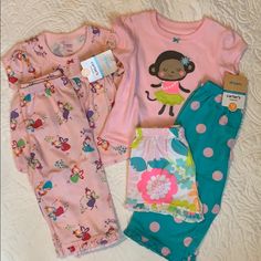 This Listing Includes Two Complete Brand New With Tags Sleep Sets. The First Set Is Two Pieces And The Color Is Pale Pink With Fairies. This Set Has A Short Sleeve Top With Pants. The Second Set Is Three Pieces Total, It Is A Pale Pink Short Sleeve Monkey Appliqu T-Shirt With Floral Shorts, And Blue And Pink Polkadot Pants. The Three Piece Set Can Be Worn Either Way. Ships Very Quickly From A Smoke Free Pet Free Home. Pink Bedtime Sets For Spring, Pink Spring Bedtime Sets, Cute Sleepwear For Playtime In Spring, Cute Pink Sleepwear Sets, Cute Multicolor Pajama Party Sets, Cute Pink Loungewear Sets, Pink Playful Sleepwear Sets, Playful Pink Loungewear Sets, Cute Pink Bedtime Top