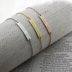 " Engrave your favorite Bible verse reference on this Bible Verse bracelet. This is a perfect gift for any occasion to remember God's Word. Please Give this Bible to your beloved ones on Christmas and Baptism. You may select engraving sides up to 2 and the color.  (Material) Bar: Gold Plated / Silver Plated / Rose Gold Plated Chain: Silver Plated /Gold Plated / Rose Gold Plated (Size) Bar: approx. 1.25\" Chain: 7\" *If you need length adjustment, please leave us a note at the checkout for the to Personalized Inspirational Jewelry For Friendship, Personalized Spiritual Jewelry For Friendship, Customizable Meaningful Friendship Jewelry, Customizable Inspirational Jewelry For Friendship, Personalized Meaningful Name Bracelet Gift, Personalized Name Bracelet For Gift, Personalized Name Bracelet For Gifts, Custom Text Stainless Steel Jewelry For Gift, Custom Text Stainless Steel Jewelry Gift