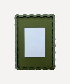 a green frame with a white square in the middle