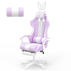 a purple and white office chair with bunny ears on it's head, next to a roll of toilet paper