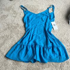 Fits Loose Mini Sundress Got It As A Gift Never Worn $25 Obo Blue Summer Mini Dress With Ruffle Hem, Blue Sundress With Ruffle Hem For Vacation, Blue Sundress With Ruffle Hem For Beach, Blue Casual Mini Dress With Ruffle Hem, Light Blue Summer Mini Dress With Ruffle Hem, Blue Breezy Sundress For Spring, Blue Mini Dress With Ruffle Hem For Vacation, Blue Mini Dress With Ruffle Hem For Day Out, Blue Mini Dress For Beach In Spring