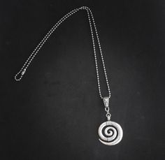 "Silver tone Swirl pendant / Necklace Measurements: Pendant Size: (35x29mm)  1 3/8\"x  1 1/8\" Chain Length: (50cm) 20\" (Can be made shorter) Accepted payments:  1)-PayPal,  2)-Credit/Debit Card through PayPal   HOW TO PAY WITH CREDIT CARD THROUGH PAYPAL:  1)Click \"Check out with PayPal\" ( even if you don't have PayPal account).  2)Choose \"Pay with Credit/Debit Card. You can do it in guest mode without owning/creating a PayPal account. If you have any questions, please feel free to contact me!" Swirl Necklace, Necklace Measurements, Spiral Pendant, Spiral Necklace, How To Make Shorts, Pendant Silver, Necklace Silver, Debit Card, Chain Lengths