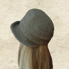 "This felted wool cloche hat is very warm. It's perfect to wear in fall/winter seasons. The hat is lightweight and easy to wear. It's well match with any outfits. One size fits most an average women's head (21.5\" - 22.5\") Composition: 100% Wool Hand wash in cold water and lay flat to dry. Do not use a dryer! NOTE Actual color may slightly different depending on your monitor. Please contact us if you have any questions for the color." Winter Wool Brimmed Cloche Hat, Wool Brimmed Cloche Hat For Winter, Classic Winter Felt Cap, Winter Wool Cloche Hat, Classic Felt Cap For Winter, Winter Wool Cloche Felt Hat, Gray Winter Cloche Hat With Curved Brim, Gray Felt Hat For Winter, Gray Fitted Felt Hat For Winter