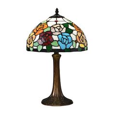 a stained glass lamp with flowers on it