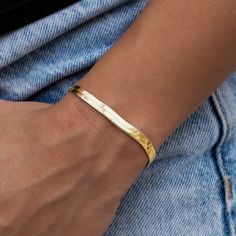 Introducing the Herringbone Bracelet- 4mm in 18k Yellow Gold! This sleek bracelet is sure to become your next staple piece adding just enough style and simplicity to any look. Featuring a classic herringbone pattern, this piece reflects light from every angle and complete with our signature 'G' clasp. Rock it solo, or pair it with the Herringbone Necklace in Yellow Gold for a matching set! This product is guaranteed for life – GLD will repair or replace the item should you experience any defects Herringbone Bracelet, Herringbone Necklace, Vermeil Jewelry, Custom Earrings, Gold Plated Bracelets, Herringbone Pattern, Pendant Bracelet, Drop Necklace, Staple Pieces