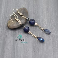 This beautiful and elegant earrings are created expertly by hand and inspired by the swirling colors of the ocean with natural dark blue gemstone sodalite, sparkling briolette and bicone crystals, made with sterling silver wire wrapped. Long and delicate briolette dangle earrings was designed to give you a sophisticated feminine look. These blue bead bohemian earrings is great for weddings or any special occasion. Perfect for a something blue gift ( Weddings) Total long each earring: 2.5" inches Blue Gemstone Beads Drop Earrings, Blue Gemstone Bead Drop Earrings, Blue Gemstone Beads Earrings For Gift, Blue Sterling Silver Earrings With Gemstone Beads, Elegant Sodalite Gemstone Jewelry, Elegant Lapis Lazuli Wire Wrapped Earrings, Elegant Wire Wrapped Lapis Lazuli Earrings, Earring Long, Blue Gemstone Earrings