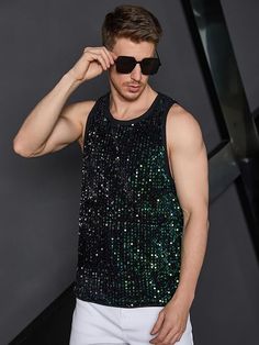 This men's black sequin tank top shirt is a stylish way to make a statement. Crafted with lightweight fabric and eye-catching sequins, it is perfect for dressing up any outfit. Durable stitching ensures a comfortable fit with no sagging. 100% Polyester Pull On closure Hand Wash or Dry Clean Quality polyester material, luxurious and lightweight fabric, soft and comfortable Brand Size Chest Waist S 43.7 40.6 M 45.7 42.5 L 48.7 45.5 XL 51.7 48.5 XXL 54.6 51.5 Black Top With Contrast Sequin For Night Out, Summer Party Tank Vest, Black Stretch Tops With Contrast Sequin, Black Tops With Contrast Sequin For Spring, Black Contrast Sequin Tops For Party Season, Black Spring Top With Contrast Sequin, Spring Black Tops With Contrast Sequin, Spring Black Top With Contrast Sequin, Black Sequin Top For Spring