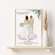 two women in wedding gowns are sitting on a shelf next to a vase with flowers