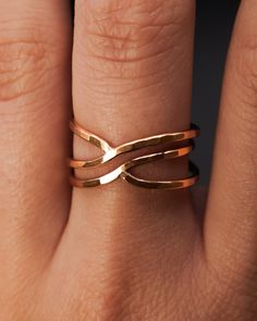 This is a smaller version of our popular Curved Wraparound ring! This ring makes a delicate and minimalist cocktail ring and is also great for everyday wear. This listing is for ONE SINGLE ring in 14K GOLD FILL.  Made from THICK (1.5mm) metal wire. Available in a SMOOTH or HAMMERED finish. This ring is unique and is sure to turn some heads! To make this style, we wrap a length of wire and then securely solder it at two points. Because the metal is not wrapped over itself, like the original Wrapa Minimalist Cocktail, Russian Ring, Delicate Gold Ring, Interlocking Ring, Woven Ring, Single Ring, Organic Rings, Gold Cocktail Ring, Spring Jewelry