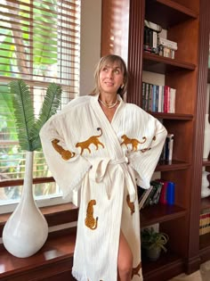 "100% Turkish Cotton Robe with handprinted Tiger Design  Available in one size. Light weight Double Gauze Fabric. 100%  Organic cotton with crinkly texture.  Open Front/loose fit The robe features a kimono collar with belt  Natural Colouring Stone Printed Design  Sustainable Fabric dyed with  plants and natural sources. Fits Mostly women's sizes 0-16. Wash cold, let it air-dry naturally  Made in Turkey  For an everyday option , we adore the Turkish organic cotton that features a kimono collar wh Spa Robe Aesthetic, Women’s Robe, Embroidered Long Sleeve Robe For Loungewear, Cute Robes, Women Nightwear Dresses, Kimono Collar, Womens Robe, Plush Robe, Cotton House