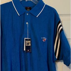 Vintage 90s U.S. Polo Assn. Terrycloth Blue Polo Sz Large Embroidered Crest Terrycloth Nwt Large Retro Blue Collared Top, Blue Retro Collared Tops, Blue Collared Retro Tops, Blue Polo Shirt With Relaxed Fit And Crew Neck, Blue Polo Collar Shirt With Relaxed Fit, Blue Relaxed Fit Polo Shirt With Crew Neck, Blue Relaxed Fit Cotton Polo Shirt, Vintage Blue Collared T-shirt, Blue Relaxed Fit Polo Shirt