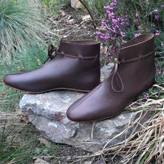 Replicas of Viking leather boots from the site of Hedeby (Haithabu) in northern Germany, 9th century. They are made of high quality cowhide leather and with a period leather sole. Traditional Ankle Boots With Leather Sole, Medieval Leather Boots With Leather Sole, Historical Leather Boots With Round Toe, Traditional Leather Boots With Rubber Sole, Viking Style Boots For Medieval Festivals With Round Toe, Viking Boots With Round Toe For Medieval Festivals, Viking Style Leather Boots With Round Toe, Viking Leather Boots With Leather Sole, Viking Leather Boots With Rubber Sole