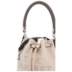 The Leather Bucket Bag by Marc Jacobs in two-tone grained leather, characterized by debossed logo on front and two-tone rope top handle. Leather logo patch applied on the back, detachable and adjustable shoulder strap, drawstring closure, leather lining and one inner card patch pocket. Siver-finished metalware. Chanel Cambon, Marc Jacobs Bag, Leather Bucket Bag, Leather Bucket, Tote Bag Leather, Year 2024, Leather Hobo, White Bag, Womens Tote Bags