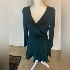 Express Brand, Forrest Green Dress, Size Xs, With Ruffles. With Elastic Waist And Sleeves, Never Worn, Tag Attached. Green V-neck Ruffle Dress For Brunch, Green V-neck Ruffled Dress, Green Fitted Ruffle Dress For Brunch, Fitted Green Ruffle Dress For Brunch, Green Ruffled Mini Dress For Fall, Green V-neck Dress With Ruffle Hem, Green Mini-length Ruffle Dress For Brunch, Green Mini Length Ruffle Dress For Brunch, Long Sleeve Fitted Ruffle Dress For Brunch