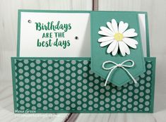 a birthday card with a daisy on it