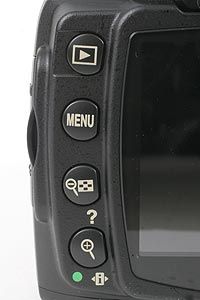 a digital camera is shown with the screen showing menus and other items on it