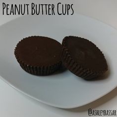 two chocolate peanut butter cups on a white plate