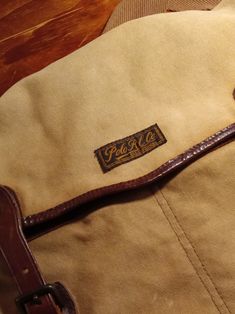 This is a very rare bag. I can't find another like it online anywhere. If you have information about it please share. Made of strong canvas material, brass hardware all stamped RL. It is in beautiful condition. I wonder if this was a prototype or a runway piece. Marked inside 59/70 most likely a limited edition of 70 wOw Please if you know anything about it let me know. Make an offer if you wish. Enjoy Daily Use Flap Bags With Dust Bag Included, Brown Canvas Shoulder Bag With Dust Bag, Brown Canvas Shoulder Bag With Dust Bag Included, Vintage Flap School Bag, Vintage Canvas Shoulder Bag For Travel, Vintage Shoulder Canvas Bag For Travel, Vintage Canvas Shoulder Bag For Everyday, Brown Canvas Satchel With Dust Bag, Rectangular School Satchel With Canvas Lining