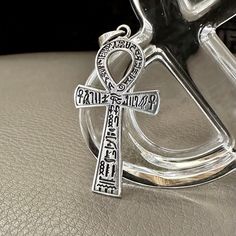 Handcrafted Solid Sterling Silver .925/ Ankh Cross Pendant 100% hand-polished solid sterling silver Ankh pendant properly crafted in solid 925 sterling silver with a 925 stamp on the backside. Ankh referred to as the key of life or the key of the nile--is representative of eternal life in Ancient Egypt. The ankh may also represent water, air, and the sun, which were meant to provide and preserve life in Ancient Egyptian culture. Width 2.7cm, Height 4.8cm, Weight 6.6grams All products here are GUARANTEED 925 Sterling Silver of finest standard. We offer a 30 day money back in our shop policies if you are not happy with the purchase. Customer experience is my first priority. I want you to feel happy with your purchase and love the item you choose. Every feedback were used to its full potentia Silver Cross Necklace With Large Pendant, Spiritual Cross Necklaces For Collectors, Symbolic Silver Cross Necklace, Sterling Silver Ankh Amulet Jewelry, Symbolic Antique Silver Pendant Necklace, Silver Necklace With Large Symbolic Pendant, Symbolic Silver Necklace With Large Pendant, Ankh Shaped Large Pendant Jewelry Gift, Silver Symbolic Necklace With Large Pendant