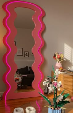 Pink LED mirror. Summer home decor. Pink wavy mirror. Apartment Aesthetic Led, Funky Apartment Decor, Curved Living Room, Pastel Room Aesthetic, Chill Apartment Vibes, Funky Apartment, Chill Apartment, Warm Apartment Aesthetic, Led Aesthetic