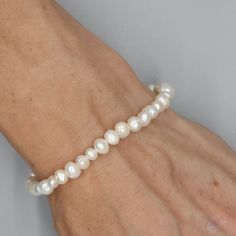 Hypoallergenic Pearl Bracelet, Hypoallergenic Pearl Bracelet With Round Beads, Hypoallergenic Pearl Bracelet With Round Beads For Everyday, Everyday Pearl White Bracelet With Round Beads, Classic Handmade Pearl Bracelet With Round Beads, Hand-strung Rondelle Pearl Bracelet Gift, Classic Handmade Pearl Bracelet, Classic Handmade Pearl Bracelet For Everyday, Classic Hand-strung Pearl Bracelet With Round Beads