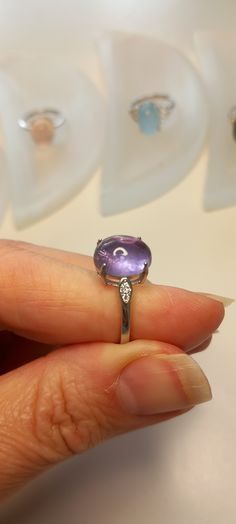 Adjustable size Elegant Amethyst Crystal Ring With Prong Setting, Elegant Amethyst Crystal Ring Round Cut, Elegant Purple Crystal Sterling Silver Ring, Elegant Amethyst Crystal Ring In White Gold, Elegant White Gold Amethyst Crystal Ring, Fine Jewelry Open Amethyst Ring For Formal Occasions, Luxury Silver Amethyst Ring With Prong Setting, Silver Gemstone Ring With Center Stone, Classic Amethyst Crystal Formal Ring