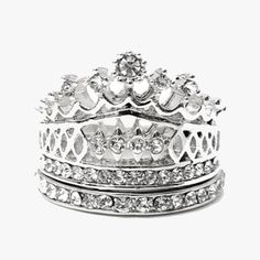 Look and feel like royalty wearing this elegant Imperial Crown Ring Set. Simply wear this set, and you'll have all the accessories you need to turn your ensemble around. With a touch of class and pretty, this piece is sure to brighten your style. You'll simply adore how it sparkles and makes you feel absolutely lavish Elegant Adjustable Crystal Ring For Party, Elegant Metal Crystal Ring With Bling, Elegant White Crystal Metal Ring, Elegant Crystal Ring With Bling, Elegant Crystal Ring With Bling For Party, Elegant Adjustable Crystal Ring With Sparkling Stones, Elegant Party Crystal Ring With Bling, Elegant Bling Crystal Ring For Party, Elegant Metal Rings With Diamond Accents