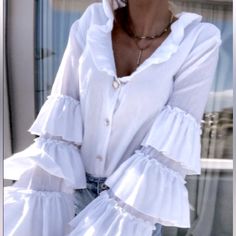 Nwt Woman’s White Frill Hem Juliet Sleeve Ruffled Blouse. Regular Fit, Soft Polyester Material With A Stand Design Neckline. Beautiful Chic Design. Size Small Summer Long Sleeve Blouse With Ruffles, Summer Blouse With Ruffles And Long Sleeves, Elegant Vacation Blouse With Ruffles, Fitted Summer Party Blouse, Elegant Ruffled Blouse For Vacation, Elegant Beach Tops With Ruffles, White Ruffle Shirt Outfit, Summer Party Blouse With Ruffles, Fitted Ruffle Beach Blouse