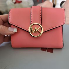 Michael Kors Carmen Trifold Wallet *New* $258. Beautiful New Saffiano Leather Trifold Wallet In **Coral Color.** Logo In Gold Snap Closure That Opens Up To Zippered Pocket, 6 Card Slots, 2 Slip Pockets. Money Pocket Full Length. Backside Has Slip Pocket. Chic Compact Pink Wallet, Chic Pink Bifold Wallet, Elegant Pink Wallets With Rfid Blocking, Pink Rfid Blocking Bags, Pink Rfid Blocking Wallet, Pink Leather Compact Wallet, Pink Compact Leather Wallet, Pink Trifold Wallet For Everyday Use, Pink Leather Bifold Wallet