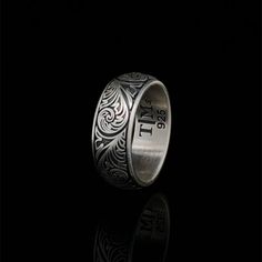 An engraved ring is a thoughtful way to turn jewelry into a true sentimental piece. Ring-engraving is a time-worn tradition, with origins often attributed to the inscription of romantic poems in jewelry of the medieval European courts. Whether you need engraved promise rings, an engraved wedding band, or engraved rings for couples, adding a message for just the two of you turns your jewelry into something truly irreplaceable. Tim's Silver gives you the meaning, and the properties of this ring. P Silver Band Engagement Ring, Hand Engraved Rings, Engraved Promise Rings, Ring Engraving, Unique Mens Rings, Gemstone Rings Vintage, Romantic Poems, Engraved Ring, Engraved Wedding