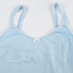 Please refer to our sizing chart for a guideline when choosing a size. 5 business days order processing time. 90% polyester 10% spandex Fitted Light Blue Spaghetti Strap Top, Fitted Light Blue Camisole, Light Blue Spaghetti Strap Top, Sleeveless Cotton Top With Bow Tie Back, Solid Backless Camisole With Straps, Fitted Cotton Tops With Bow Straps, Trendy Solid Color Spaghetti Strap Camisole, Backless Camisole With Straps, Elegant Tops With Spaghetti Bow Straps