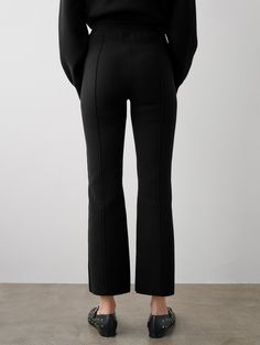 These double-knit cotton pants combine the comfort of sweats with the refinement of tailoring. An elastic waistband ensures comfortable all-day wear, while raised seams elongate the legs. Style it with the coordinating jacket on travel days, or dress it up with a collared shirt during the week. Estimated to ship on 4/25/24. Details Inseam Length in size small is 27". The model is 5'10" and is wearing a size small. 79% Organic Cotton, 21% Lycra. Hand wash cold or dry clean. Do not twist or wring. Winter Workwear Bottoms With Ribbed Waistband, Fall Workwear Sweatpants With Pull-on Style, Solid Bottoms With Ribbed Cuffs For Workwear, Solid Workwear Bottoms With Ribbed Cuffs, Fall Athleisure Sweatpants For Casual Wear, Modern Bottoms With Minimal Stretch For Fall, Fall Athleisure Pants For Workwear, Winter Workwear Athleisure Pants, Winter Athleisure Workwear Pants