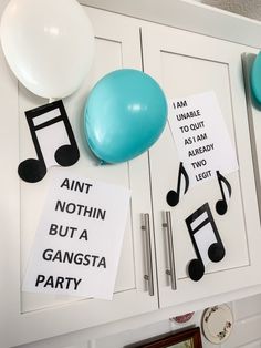 balloons, notes and music notes on a cabinet