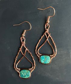 handmade earrings with turquoise and copper wire Artisan Wire Wrapped Copper Earrings, Artisan Copper Wire Wrapped Earrings, Turquoise Artisan Electroformed Earrings, Artisan Hand Wrapped Copper Earrings, Hand Wrapped Copper Dangle Earrings, Handmade Turquoise Earrings With Copper Wire, Turquoise Wire Wrapped Copper Earrings, Artisan Turquoise Earrings In Copper, Artisan Turquoise Copper Earrings