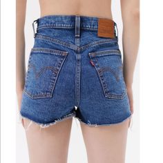 New With Tags. Slim-Fit Denim Shorts From Levi's Cut With A Super High Rise. Rigid Denim Cut With A Raw Hem For Casual Styling. Essential 5-Pocket Design Finished With A Button Fly. - 100% Cotton - Machine Wash - Model Is 5’10” And Wearing Size 27 Standard Measurements: - Rise: 11.5” - Inseam: 2” Fitted Cutoff Dark Wash Bottoms, Fitted Dark Wash Cutoff Bottoms, Mid-rise Denim Blue Jean Shorts With Belt Loops, Dark Wash High-waisted Jean Shorts With Belt Loops, Mid-rise Denim Shorts With Belt Loops, Denim Blue High-waisted Shorts With Belt Loops, High-waisted Denim Blue Shorts With Belt Loops, Denim Shorts With Belt Loops, High-waisted Shorts With Belt Loops In Denim Blue