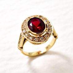 Gold Ruby Ring set with Created Ruby in perfect diamond cut, flawless clarity & deep red color, at 10x8mm, 3 Carats, with small CZ Diamonds on the band.  Gold Victorian Ring design made of Gold Vermeil ☞ thickest 18k Gold Plating on top of Solid 925 Sterling Silver ☞ made to last. ☞ Choose your size ☞ I resize (before shipping) for FREE to Any size* Matching Pendant: www.etsy.com/listing/929984209 Matching Earrings: www.etsy.com/listing/963504392 ⌛Last Ring left ⌛   Details :  ♥ Each item comes Red Diamond Ring, Antique Ruby Ring, Ruby Ring Set, Red Ruby Ring, Gold Ruby Ring, Rubin Ring, July Birthstone Ring, Ruby Ring Gold, Victorian Ring