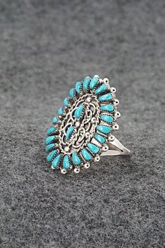 This turquoise and sterling silver ring was made by Zuni silversmith Milburn Dishta. The back is stamped M. Dishta, and Zuni, N.Mex.Size: 9Length: 1 1/4"Width: 7/8"Free shipping on all orders! We ship with USPS and always include tracking. All orders ship within a day of payment.Returns are accepted up to 30 days after you receive your order. Just send us a message. Our shop offers cash back or store credit. The item must be returned in new condition. Instagram Jewelry, Navajo Rings, Authentic Jewelry, Pearl Chain, Native American Jewelry, Turquoise Sterling Silver, Free Jewelry, Sterling Silver Ring, Favorite Jewelry