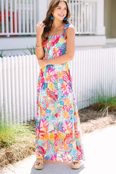 You are going to run to this maxi dress any chance you get! I just know it! That print is vibrant and colorful! The smocked bust also keeps this maxi super comfy and flattering! This maxi is perfect for summer parties and vacations! This maxi dress features a square neckline, smocked bust, colorful floral print, and tied adjustable straps.  Material has no amount of stretch.Sydney is wearing the small. Colorful Floral Print Maxi Dress For Summer, Vibrant Print Maxi Dress For Spring And Summer Parties, Spring Maxi Dress With Vibrant Print For Summer Parties, Multicolor Tropical Print Maxi Dress For Summer, Colorful Floral Print Summer Maxi Dress, Multicolor Print Summer Maxi Dress, Multicolor Print Maxi Dress For Summer, Summer Style Multicolor Print Maxi Dress, Summer Style Maxi Dress With Smocked Back