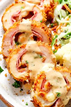 chicken cordon bleu on a white plate